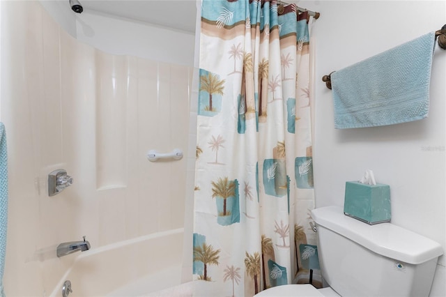 bathroom with shower / bathtub combination with curtain and toilet