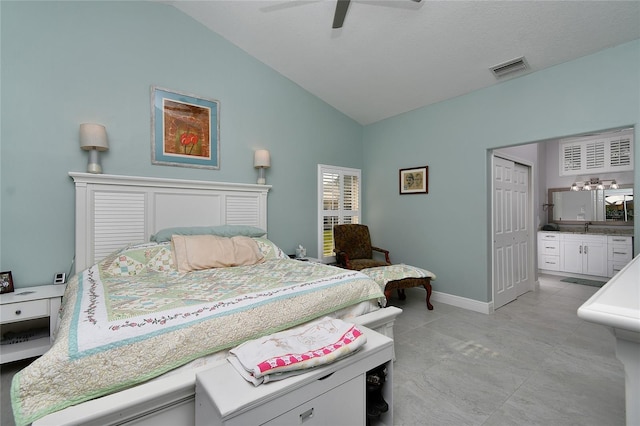 bedroom featuring sink, vaulted ceiling, and ceiling fan