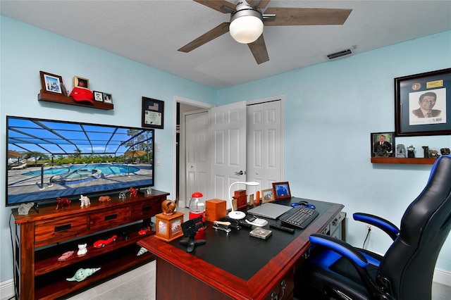 home office with ceiling fan