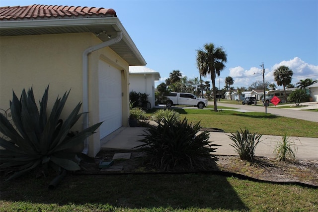 view of yard with a garage