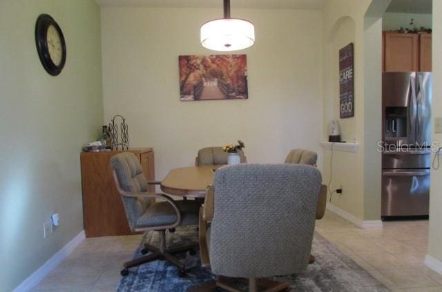 view of tiled dining area