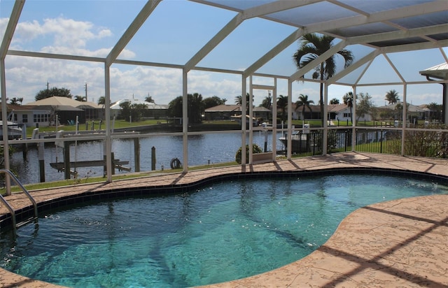 view of pool featuring a lanai and a water view