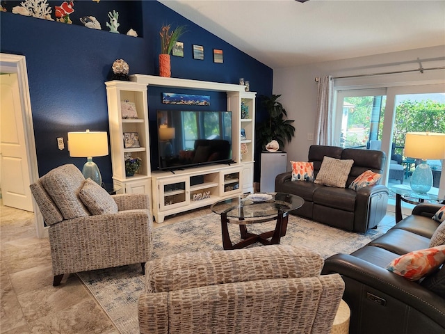 living room with lofted ceiling