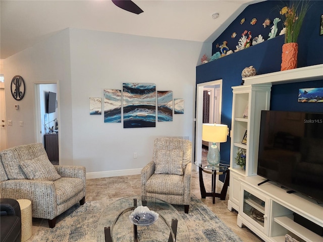 living area with lofted ceiling and ceiling fan