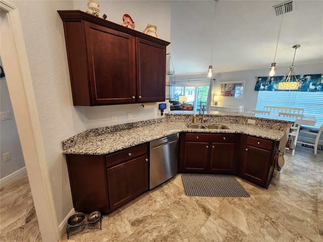 kitchen featuring decorative light fixtures, dishwasher, sink, light stone counters, and kitchen peninsula