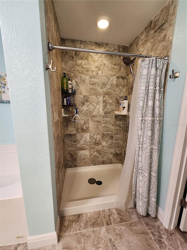 bathroom featuring walk in shower