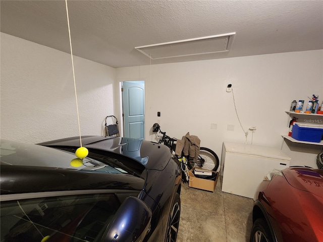 garage featuring fridge