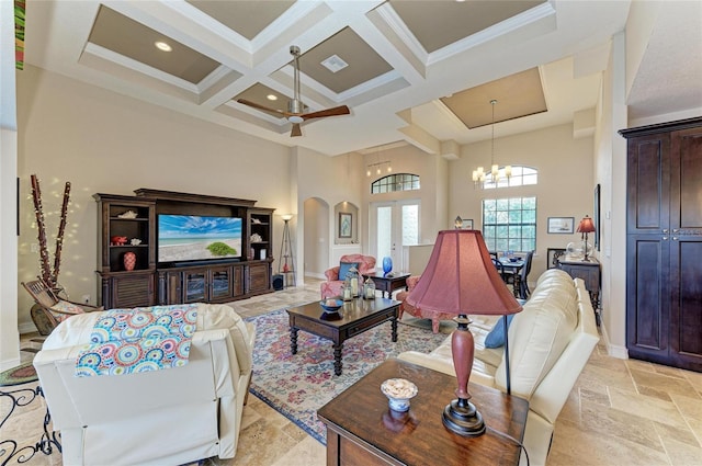 living room with french doors, coffered ceiling, crown molding, beam ceiling, and a high ceiling