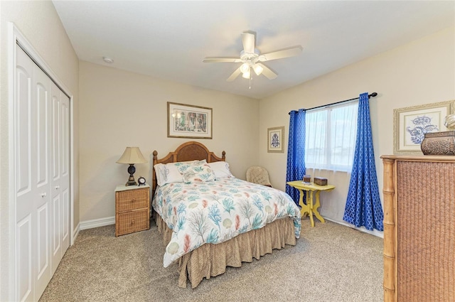 bedroom featuring carpet, ceiling fan, and a closet