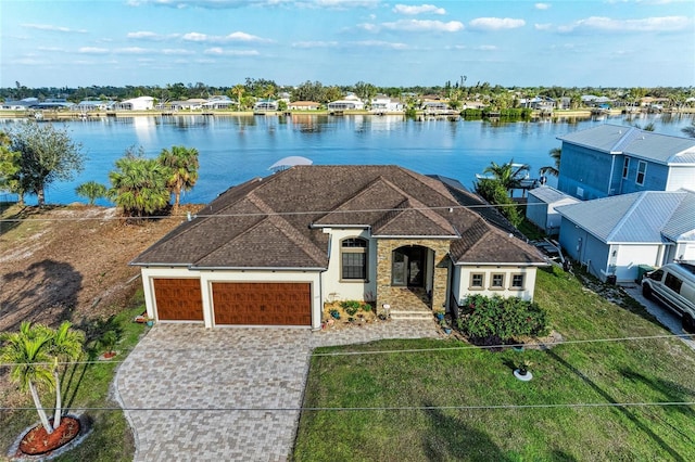 aerial view featuring a water view