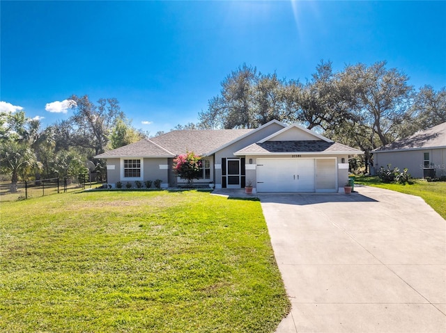 single story home featuring central AC unit, a garage, and a front yard