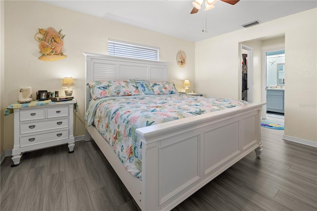 bedroom featuring dark wood-type flooring and ceiling fan