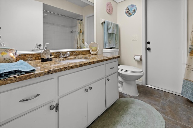 bathroom with tile patterned flooring, vanity, a shower with shower curtain, and toilet