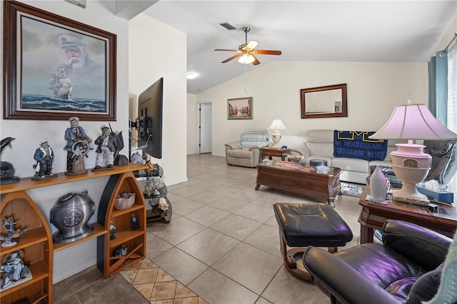 tiled living room with visible vents, ceiling fan, and vaulted ceiling