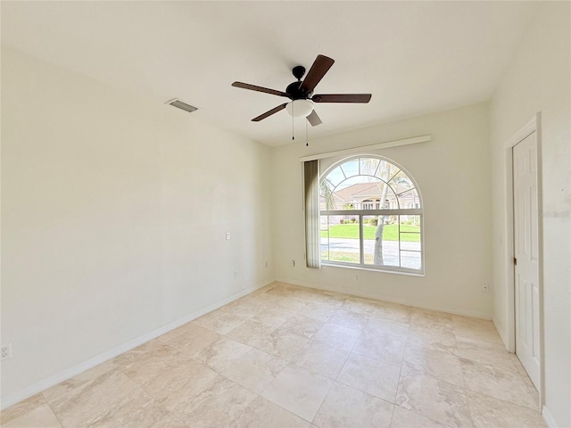 spare room featuring ceiling fan