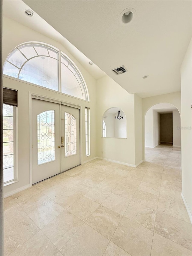 foyer featuring french doors