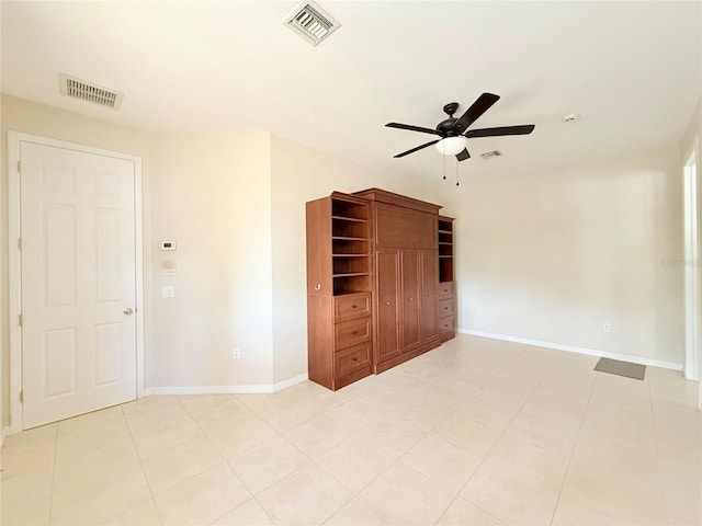 unfurnished bedroom featuring ceiling fan