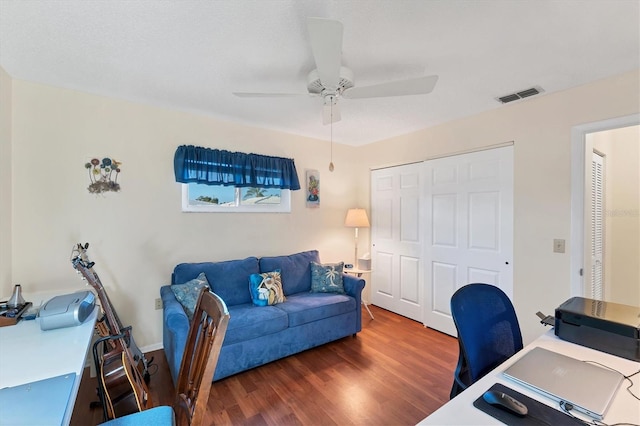 office featuring ceiling fan and dark hardwood / wood-style flooring