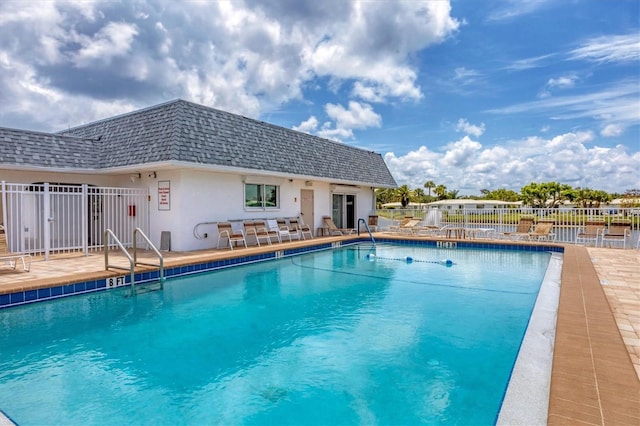 view of pool featuring a patio area