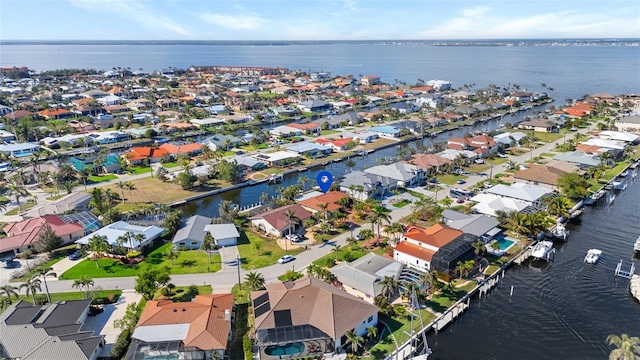 bird's eye view with a water view