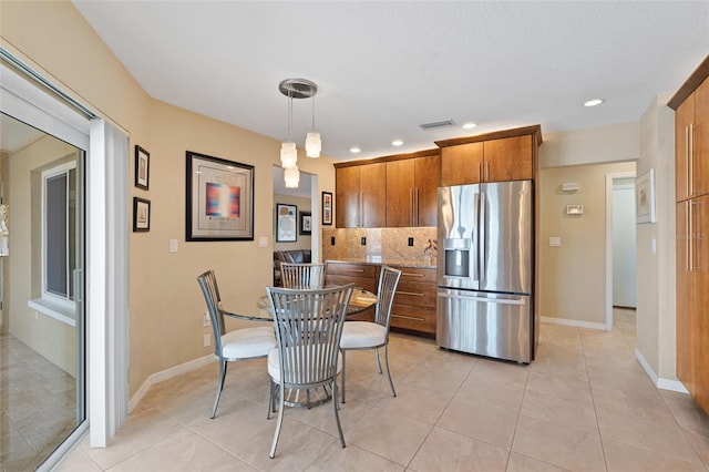 view of tiled dining space