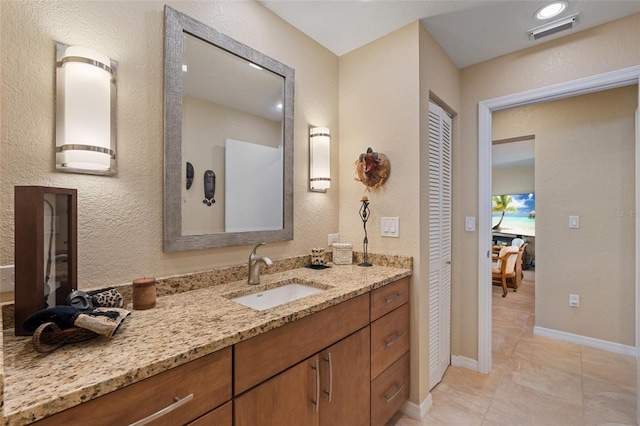 bathroom featuring vanity