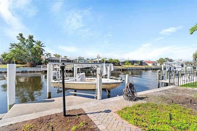 dock area featuring a water view