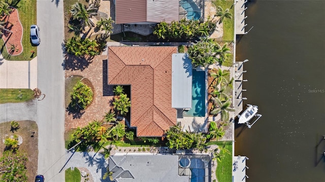 bird's eye view with a water view