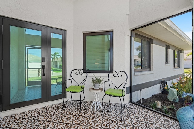 doorway to property featuring french doors