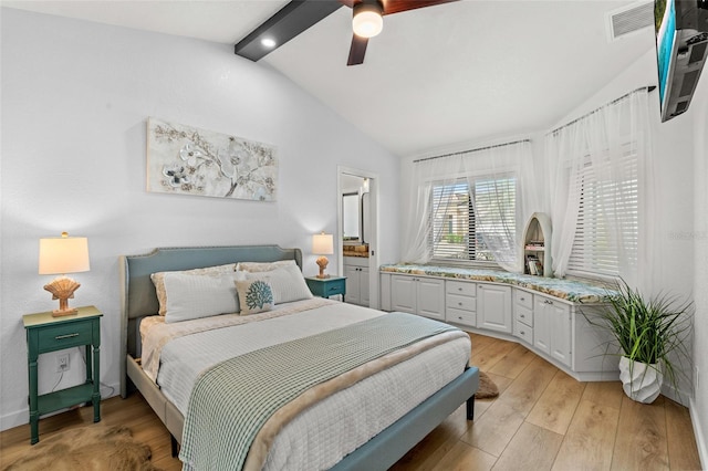 bedroom featuring vaulted ceiling with beams, ceiling fan, light wood finished floors, and visible vents