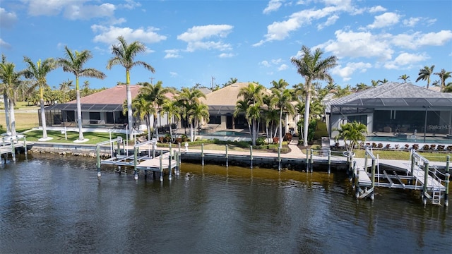 view of dock with a water view and a lanai