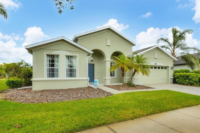 view of front facade featuring a garage and a front lawn