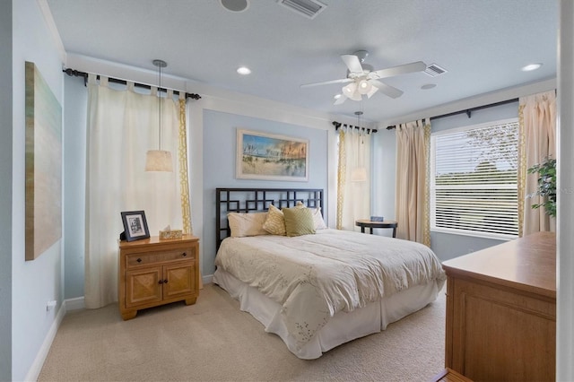 bedroom featuring ceiling fan and light colored carpet