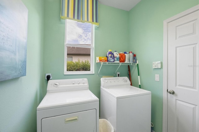 laundry area featuring washing machine and dryer