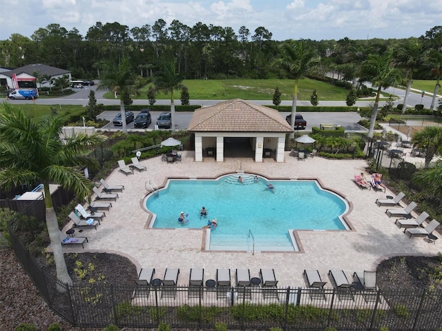 view of swimming pool with a patio