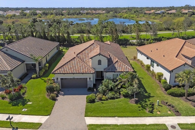 bird's eye view with a water view