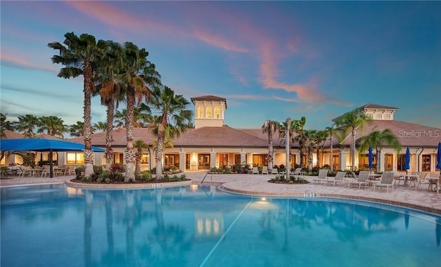 community pool featuring a patio area