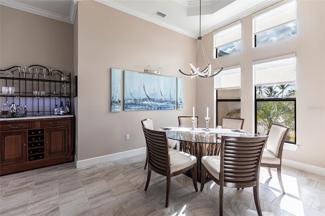 17122 Barcrest Ln, Punta Gorda, FL 33955 - dining area with a chandelier and crown molding