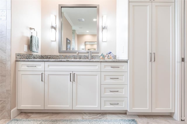 17122 Barcrest Ln, Punta Gorda, FL 33955 - full bathroom with marble look tile flooring, vanity, and recessed lighting