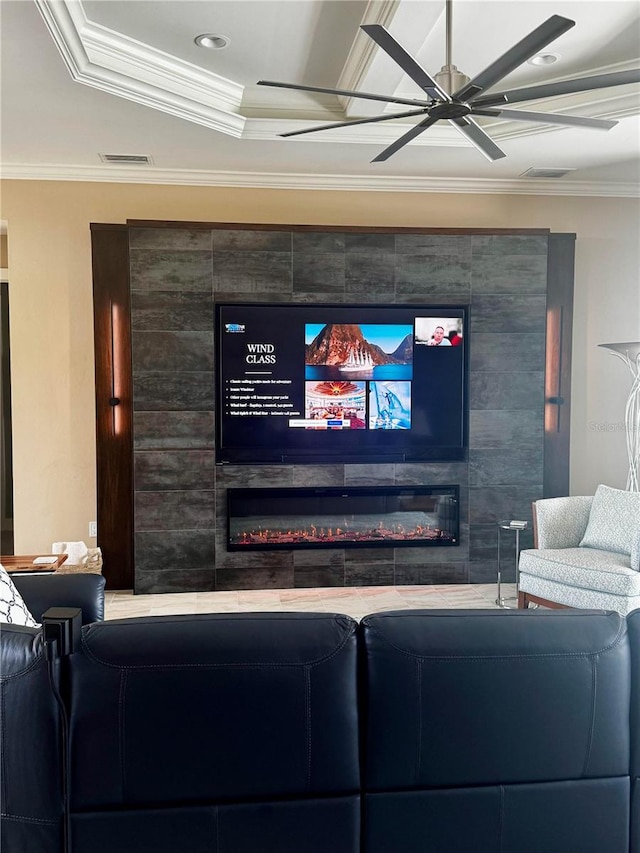 17122 Barcrest Ln, Punta Gorda, FL 33955 - home theater with a tiled fireplace, ornamental molding, a ceiling fan, and recessed lighting