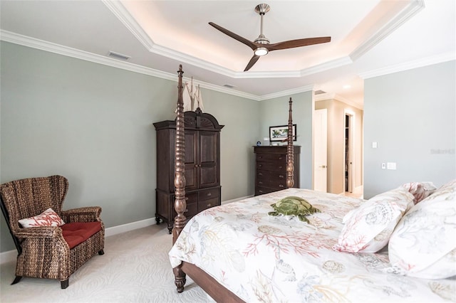 17122 Barcrest Ln, Punta Gorda, FL 33955 - bedroom featuring a tray ceiling, light carpet, crown molding, and a ceiling fan