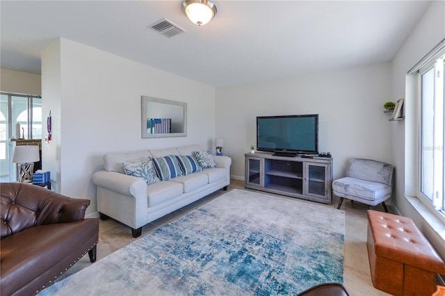 living room featuring light tile patterned flooring