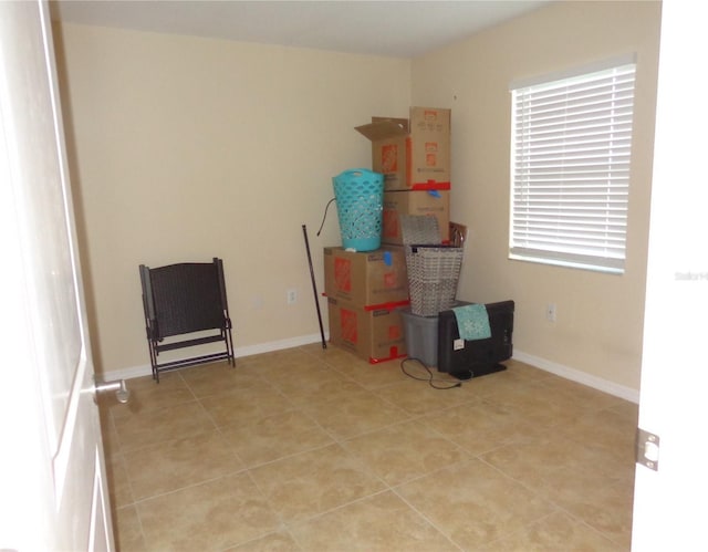 miscellaneous room featuring light tile patterned floors