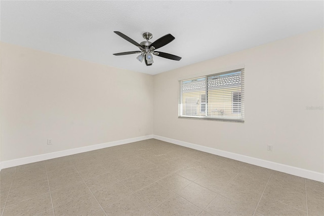 unfurnished room featuring ceiling fan