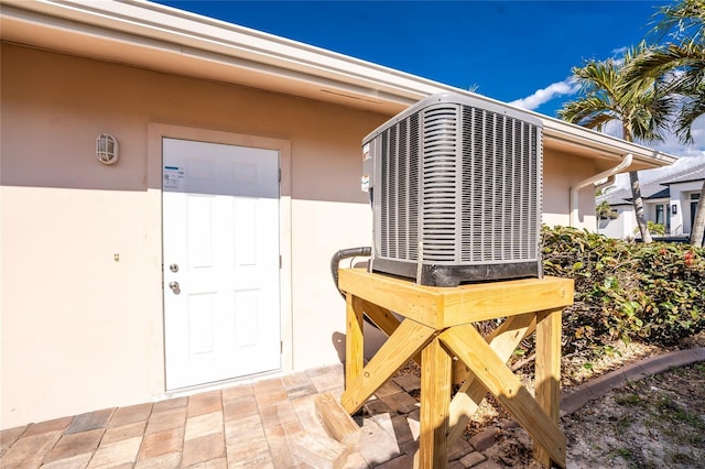 entrance to property featuring central AC