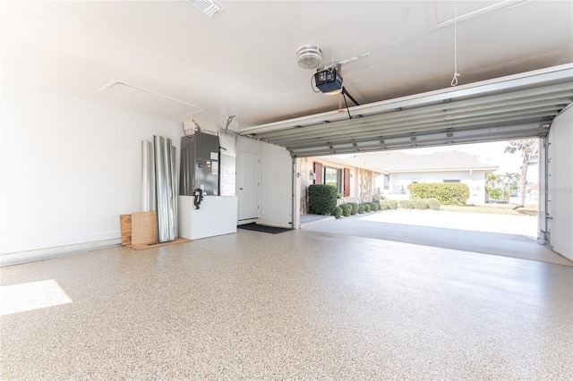 35 Sabal Dr, Punta Gorda, FL 33950 - garage featuring a garage door opener