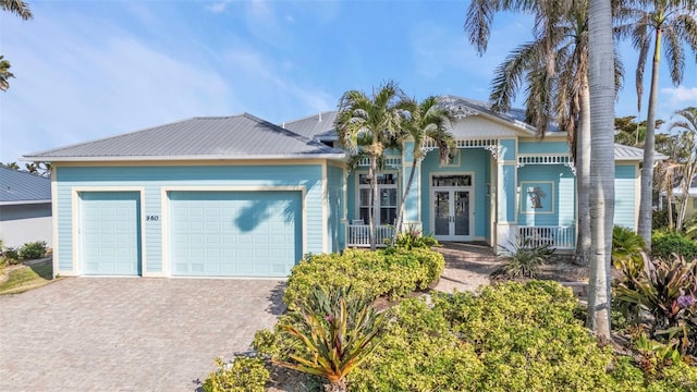 view of front of house featuring french doors and a garage