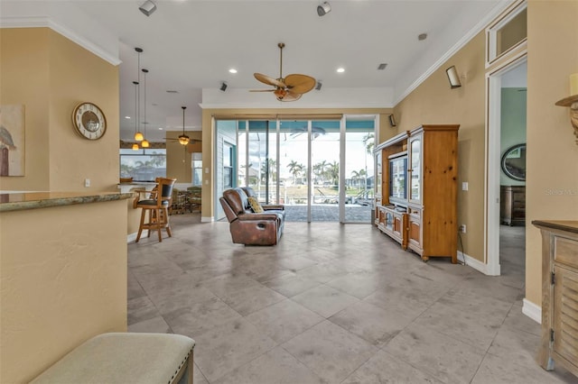 living room featuring crown molding and ceiling fan