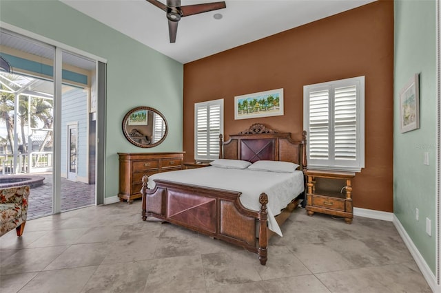 bedroom featuring multiple windows, access to outside, ceiling fan, and light tile patterned floors