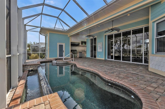 view of swimming pool featuring a patio area, area for grilling, ceiling fan, and glass enclosure